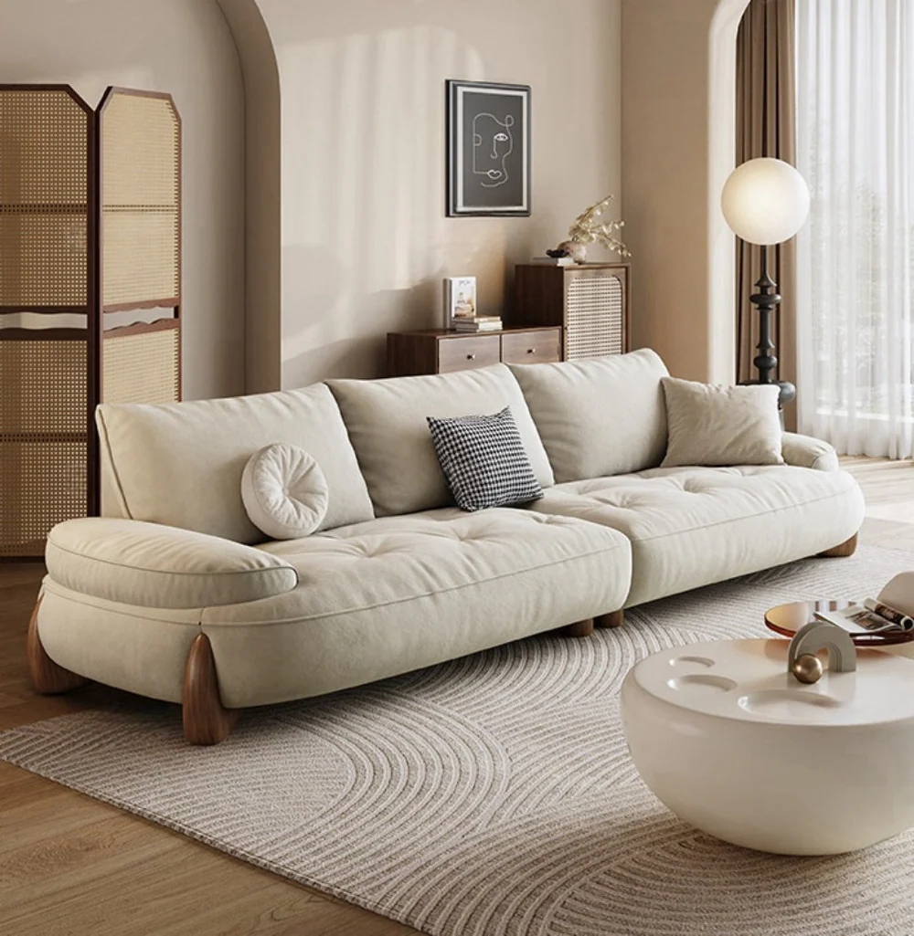 ADOUER WOOD Beige sofa with unique legs in a living room with a coffee table