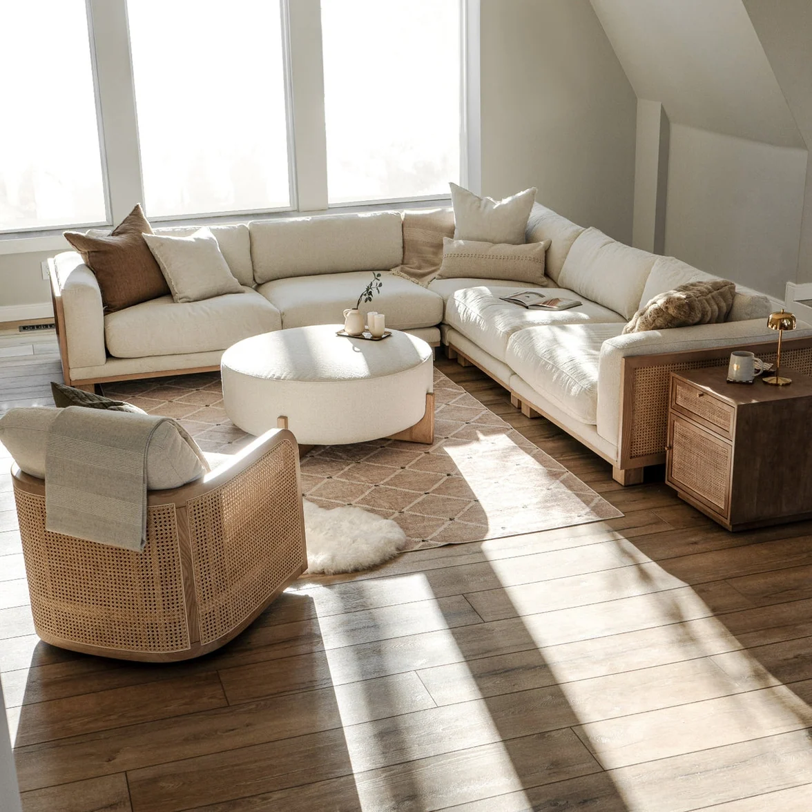 ADOUER WOOD Modern living room with a sectional sofa armchair and round coffee table